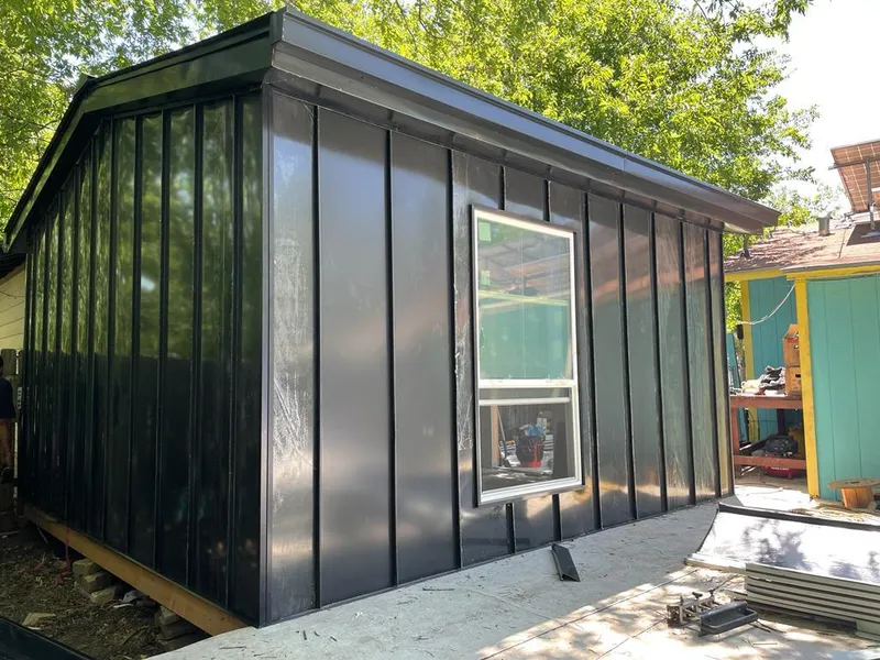 Black standing seam metal wall panels for Metal Roof Installation in Hamden