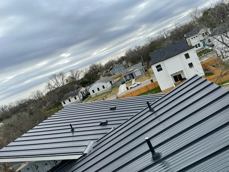 Standing seam metal roof panels with vents for Skylight Repair in Hamden